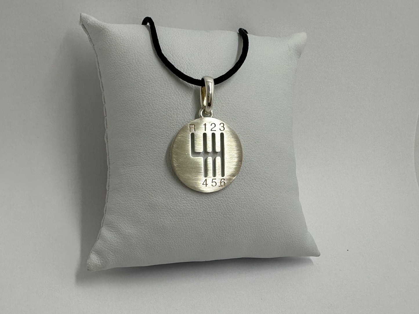 pendentif boite vitesse