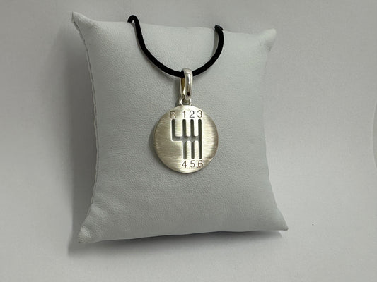 pendentif boite vitesse