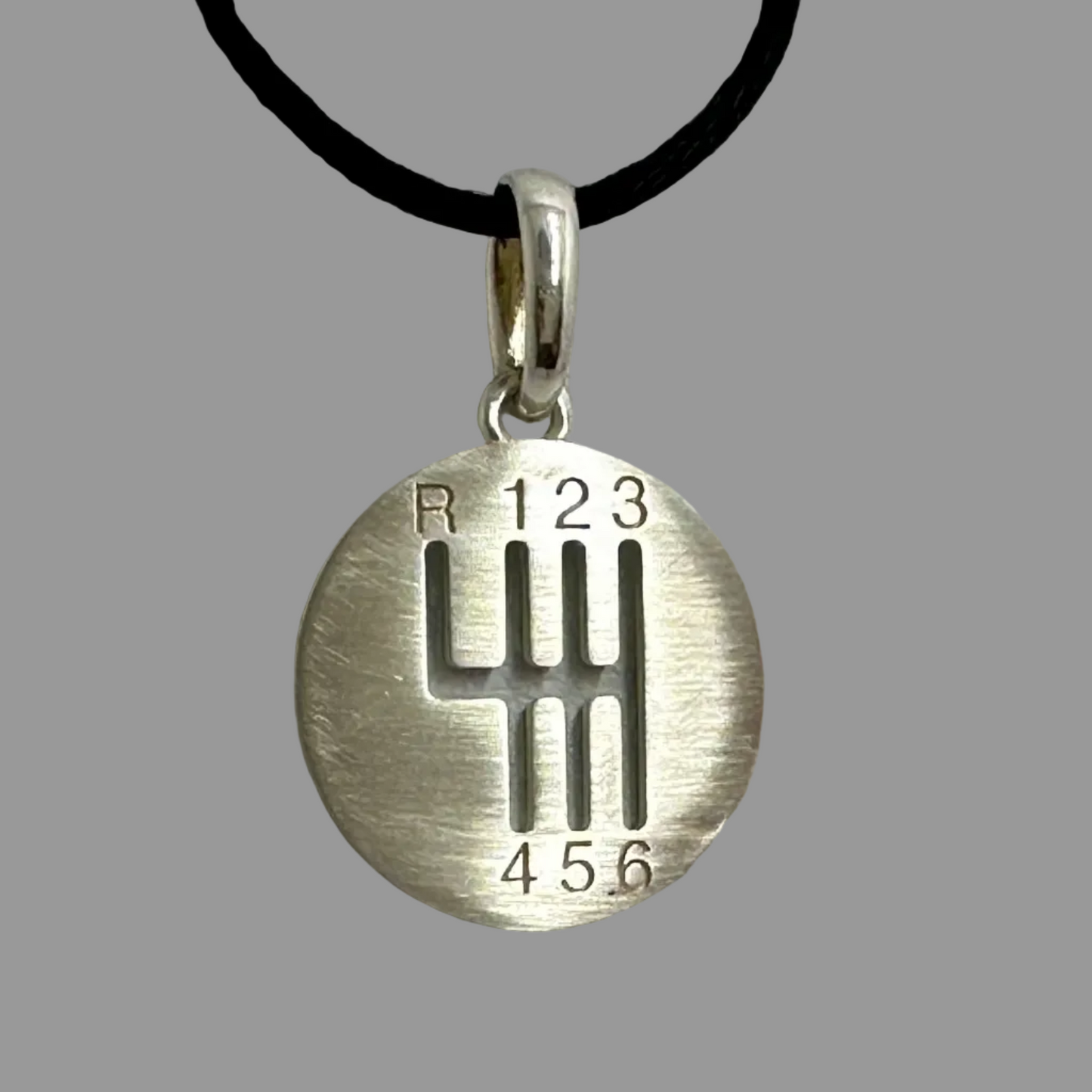 pendentif boite vitesse